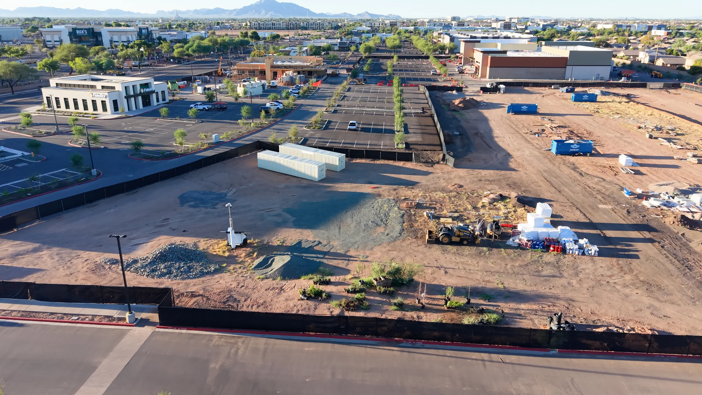 Construction at Signature at SanTan Village in Gilbert, with the older DICK’S Sporting Goods store visible across the road.